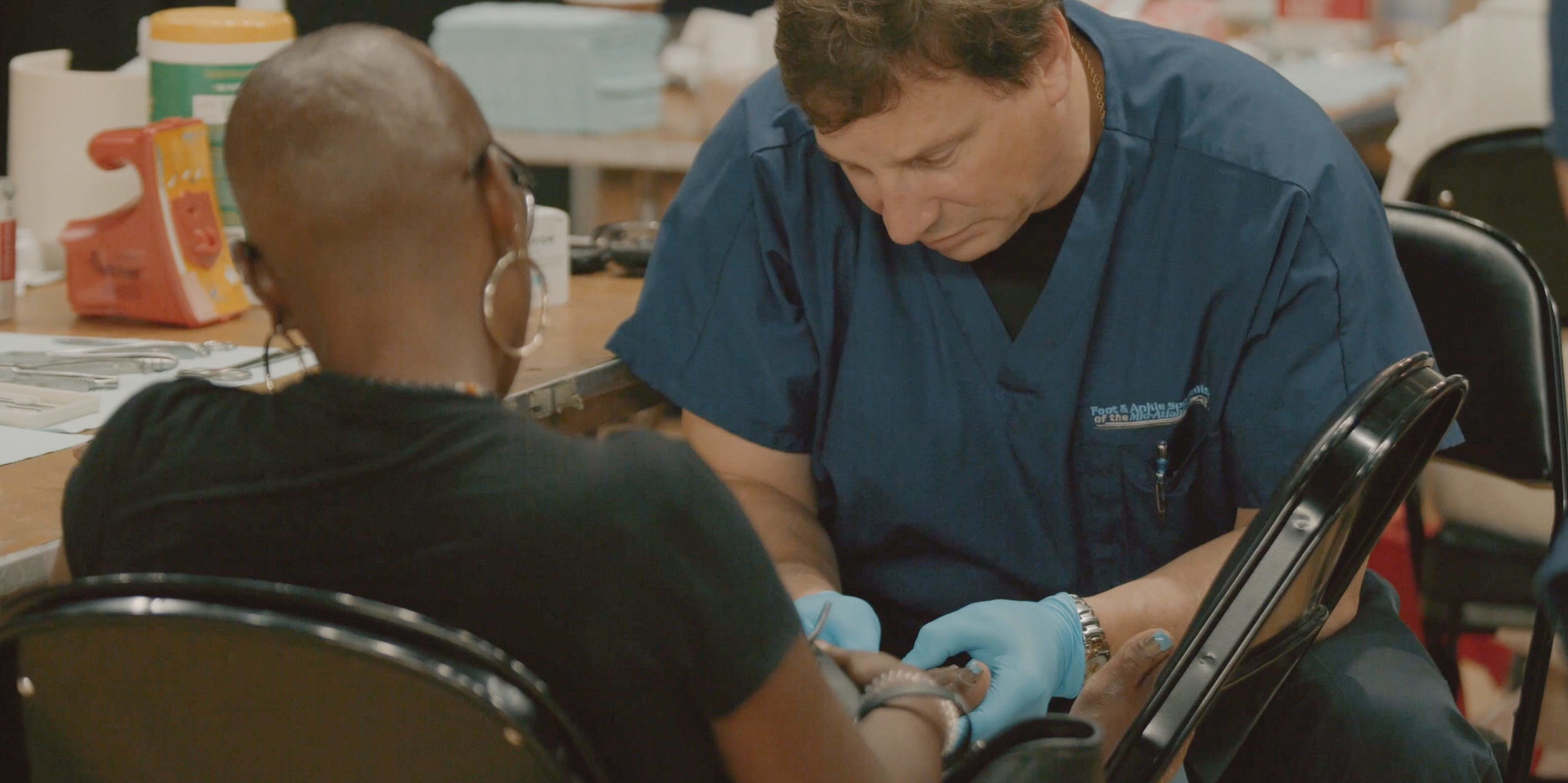 Man administering a shot